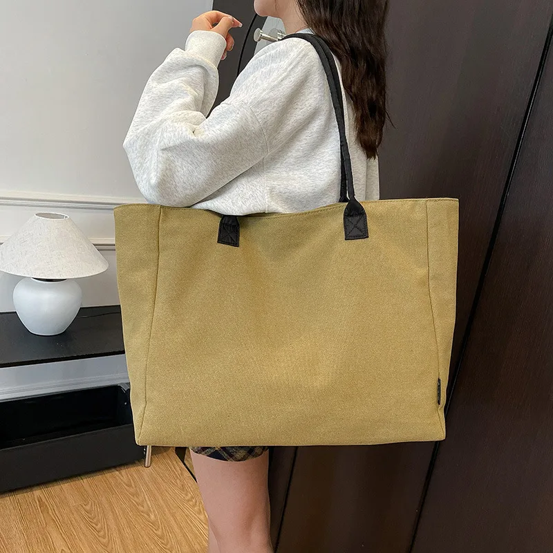 

2025 New Simple Fashion Large Capacity Canvas Tote Bag Casual Shoulder Bag Commuter Lightweight Handbag Women's Shopping Bag