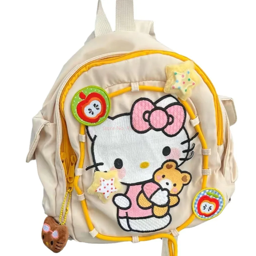 Mochila con estampado de Hello Kitty Sanrio, mochila para estudiantes a prueba de polvo, mochila de viaje multifuncional Simple, regalo de Navidad para niña