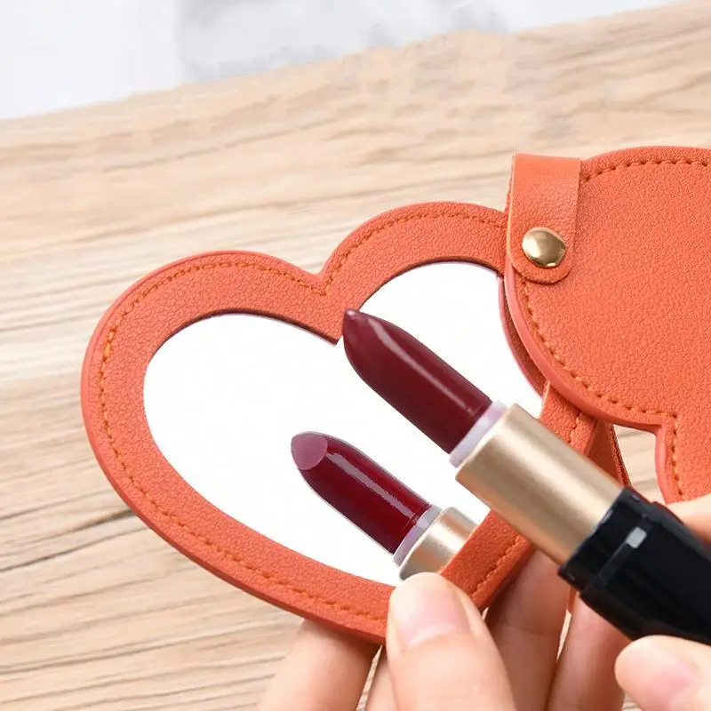 بو الجلود واحدة الجانب مرآة ماكياج الجمال المفاتيح على ظهره الشنق المحمولة النساء شكل قلب مرآة لوضع مساحيق التجميل كيرينغ