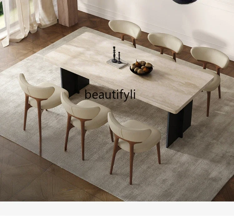 

French travertine rock slab dining table and chair combination simple rectangular designer dining table