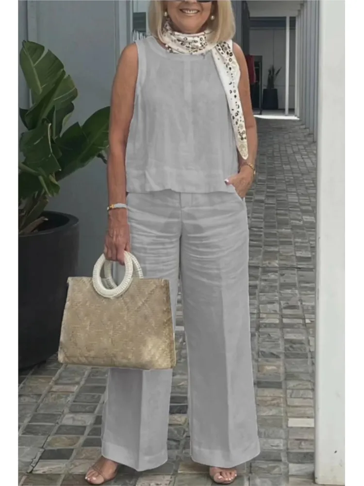 Abito da donna nuovo estivo Top senza maniche Pantaloni a gamba larga Set da due pezzi Moda Casual Solid Holiday Set da 2 pezzi Abbigliamento da donna