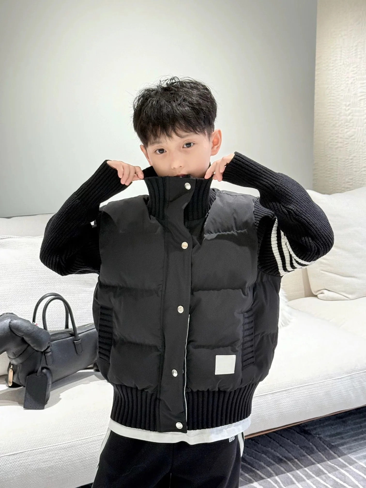 

2025 Winter New Men's and Women's Small Standing Collar Short Wool Knitted Sleeve Spliced Down Cotton Jacket