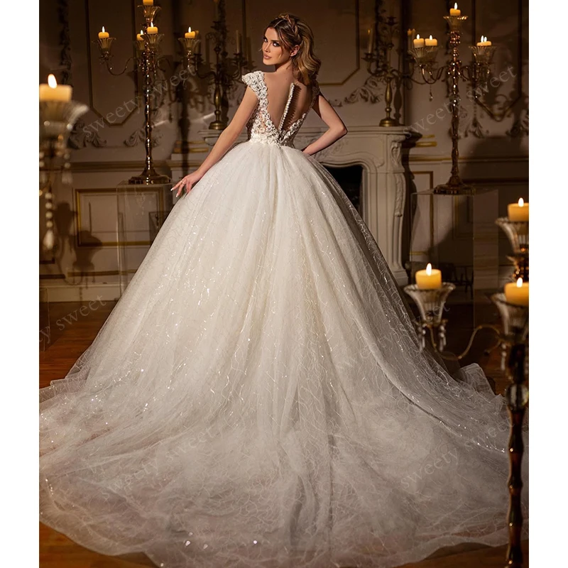 

Glitter Wedding Dress Embroidered Lace On Net With Sequins Ball Gown Sleeveless O-Neck Customized Bride Button Vestido De Novia