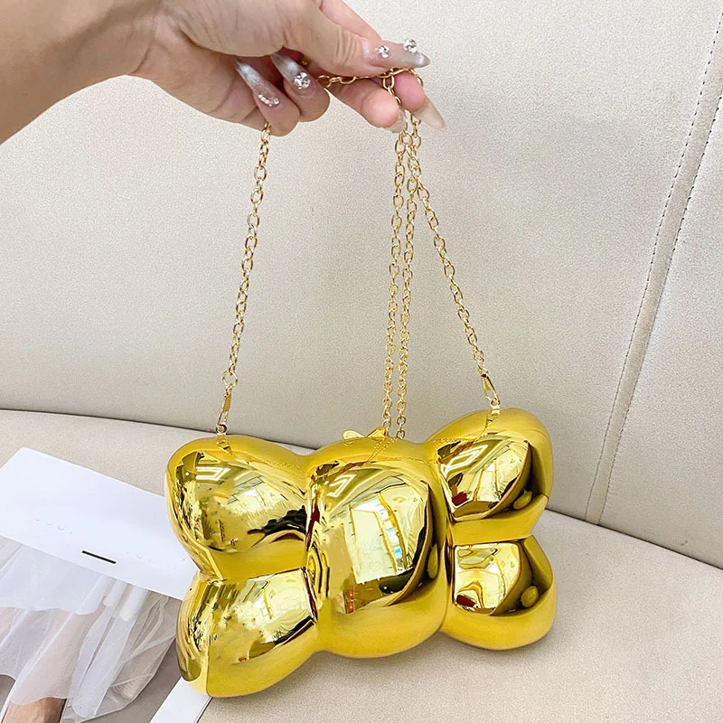

Metal bow shape acrylic bag trendy personality niche design hand held dinner messenger bag