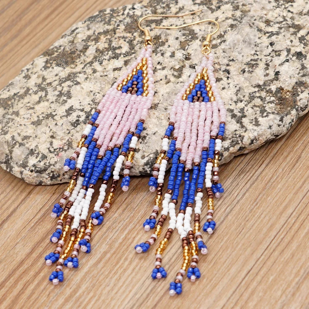 

Fringe Earrings Hand knitting fashion Bohemia Beading Simple Swallow tail alloy female geometry Rice Bead Earrings