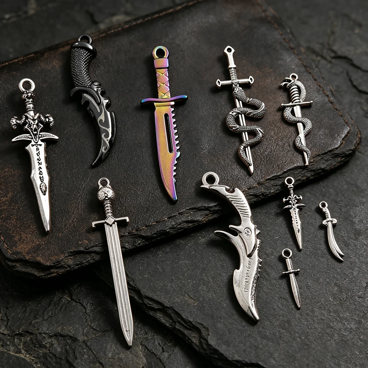 10-Piece Set of Mixed Vintage-Style Swords and Knives for DIY Crafts, Including Colorful Blade Daggers, Black-Handled Curved Swords, Snake-Wrapped Long Swords, Magic Head Short Swords, and Mini Weapons in Various Designs, Suitable for DIY Bracelets, Necklaces, Earrings, Pendants, and Handmade Beaded Decoration Accessories