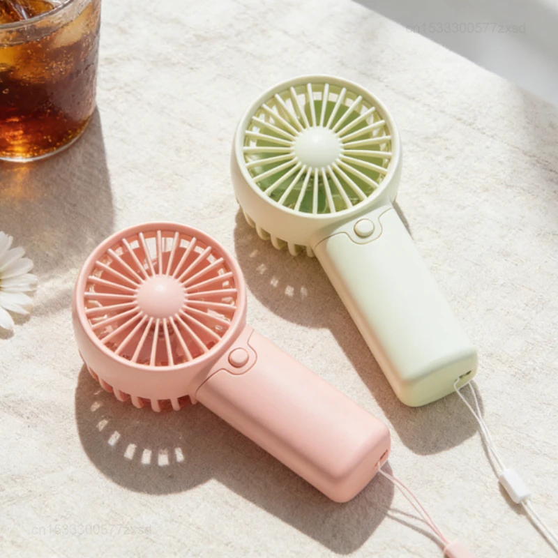 

Милый мини-портативный ручной вентилятор, легкий, компактный, карманный, с низким уровнем шума, маленький электрический вентилятор для охлаждения, портативный ручной вентилятор для улицы и дома