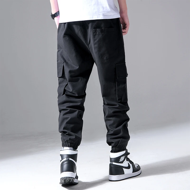 Moda męska Hip Hop Cargo spodnie z wieloma kieszeniami modna odzież uliczna solidne spodnie dresowe Casual bawełniane biegacze męskie — zdjęcie 4