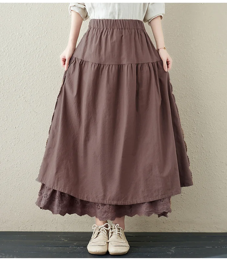 Rok bertali berlapis linen dengan sulaman tebal dan ikat pinggang elastis, sedang hingga panjang, desain A-line yang manis