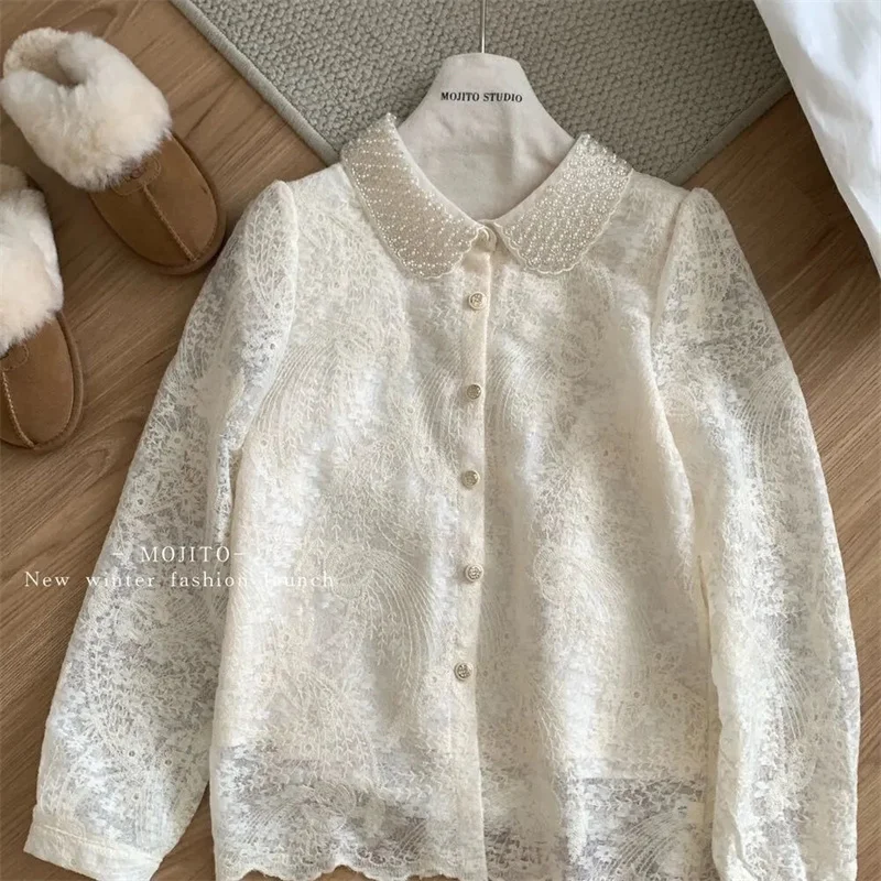 

Французская тяжелая промышленность, бусина для ногтей, маленькая ароматная стильная кружевная рубашка с кукольным воротником, новинка 2025, весенняя темпераментная рубашка с длинными рукавами, топ