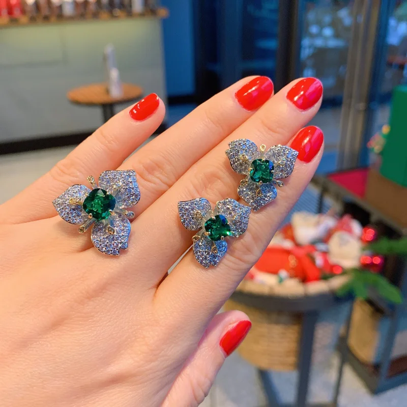 

European and American High-End Full Diamond Three-Dimensional Emerald Zircon Ring Red Corundum Three-Petal Flower Zircon Stud Ea