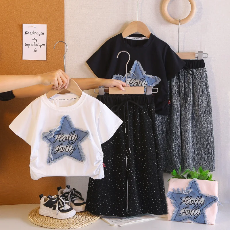 

Summer new girls' clothing set: round-neck top with star patch and rhinestone embellished long pants, two-piece set wholesale