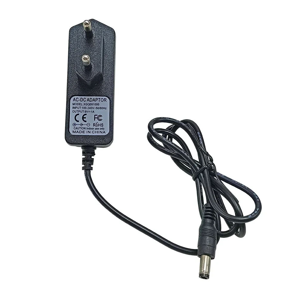 Adaptador de fuente de alimentación para Pedal de guitarra DC 9V 1A, piezas de guitarra para instrumento Musical negro AC para Pedal de efectos, enchufe europeo