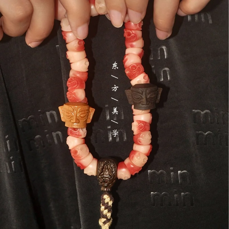 

Bone A Dai With Sanxingdui Bracelet Handheld