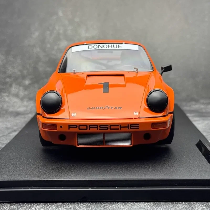 รถโซลิโดรุ่น 1/18 ปอร์เช่ 911 IROC 1974 4 #   1 Follmer รถจําลองห้องจอแสดงผลรถยนต์รุ่น Boy Collection ของขวัญ