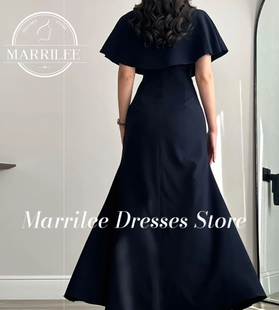 Marrile Customized Navy Blue Evening Gown with a square neckline and an attached cape - like overlay The cape is adorned with