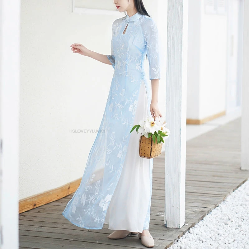 ملابس السنة الصينية التقليدية الجديدة للمرأة فستان شيونغسام التطريز خمر الإناث تشيباو الشرقية فيتنام أوداي فستان