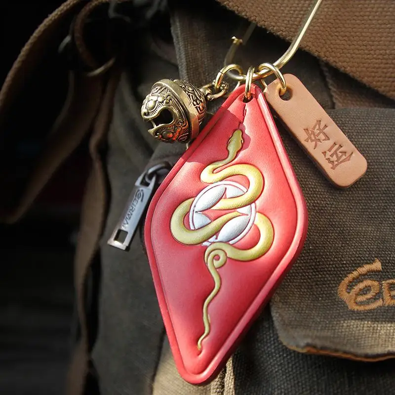 

Handmade leather bag pendant car keychain bag ornament zodiac high-end gift style pendant decoration for the Year of the Snake