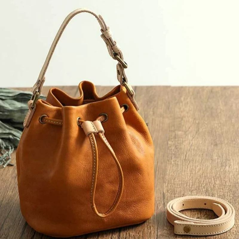 New Natural Leather Drawstring Bucket Bag with Adjustable Shoulder Straps for Vintage Style Tassel Style Fashionable Women\'s Bag