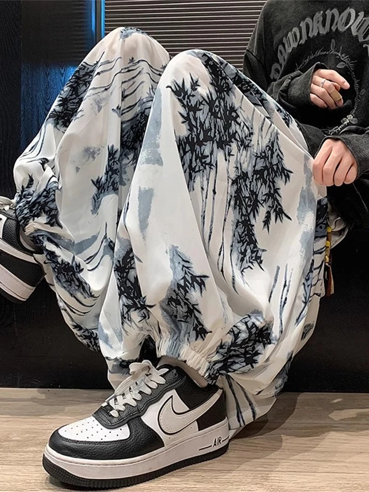 

Новые китайские мужские повседневные брюки свободного кроя с широкими штанинами из ледяного шелка, брюки-шаровары из бамбукового шелка, свободные, удобные, для отдыха