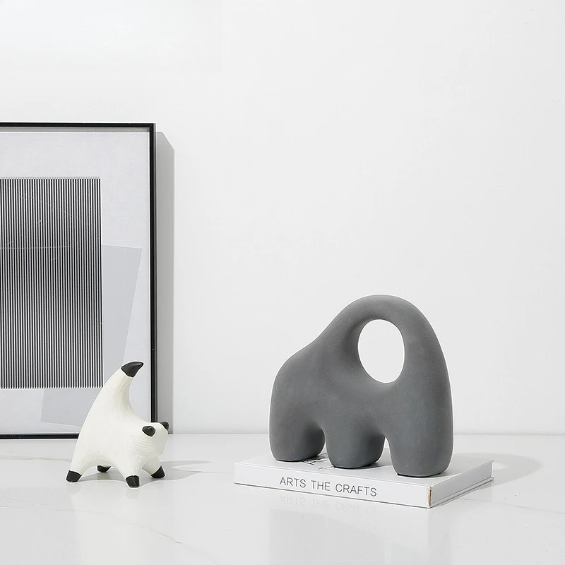 

Nordic minimalist high-grade gray flocking ceramic portable hole ornament, TV cabinet creative decoration