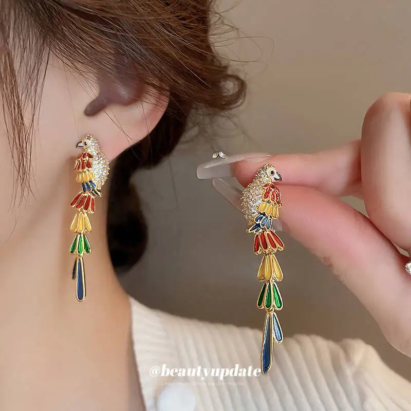 

Real gold electroplated silver needle colored zircon long parrot retro palace style artistic temperament