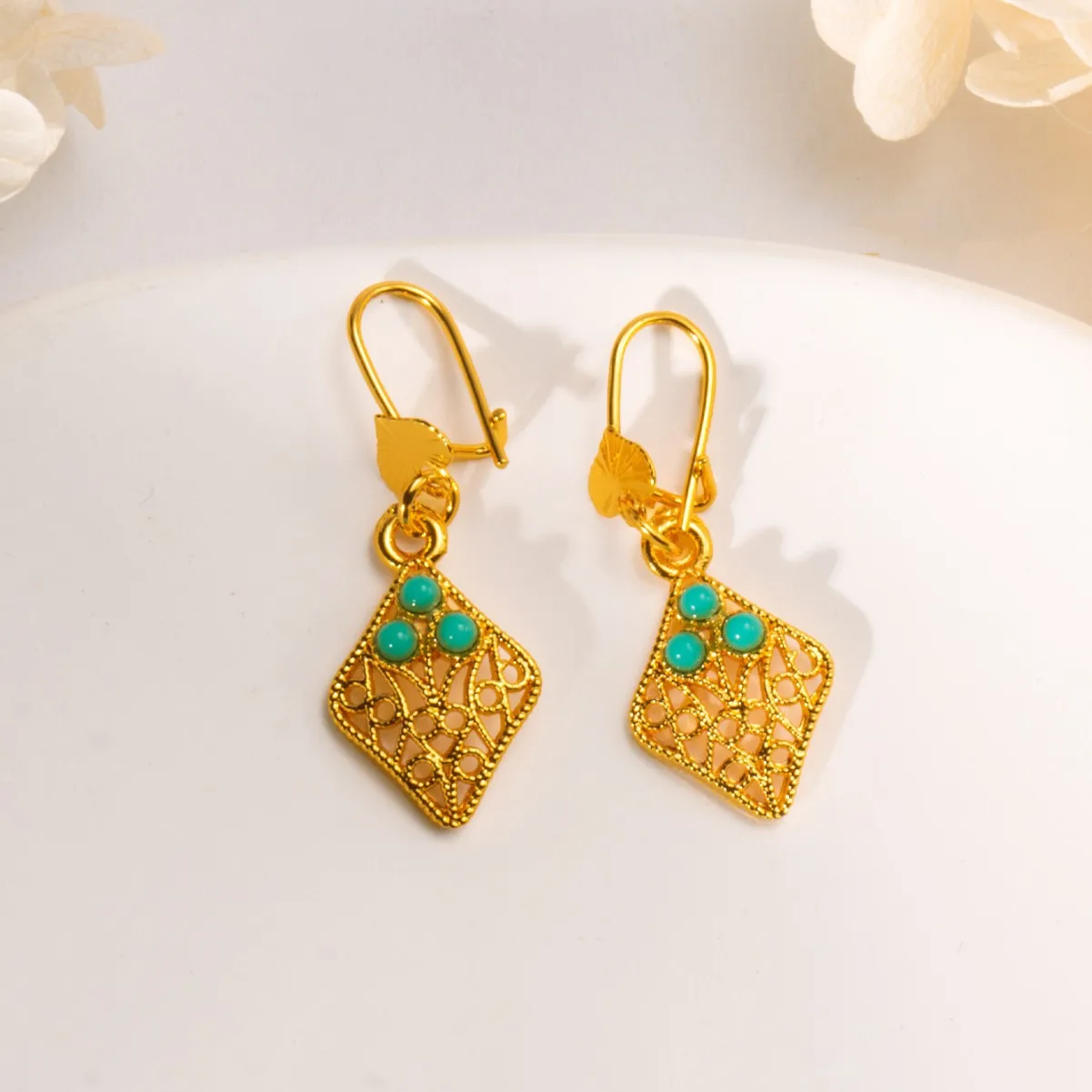 9999 gold Bohemian-style ear ornaments with high-end African fringes and hollowed-out leaf-shaped earrings