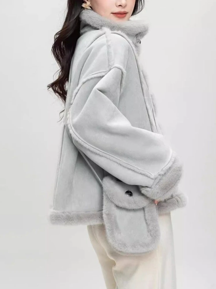 2025 Cappotto di pelliccia simulata delle nuove donne di moda invernale Cappotto caldo ispessito con colletto alla coreana integrato in pelliccia imitazione ispessita