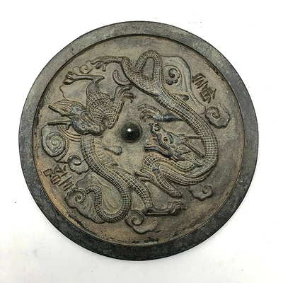 Antique decoration of bronze mirror with Double Dragons in the Warring States Period