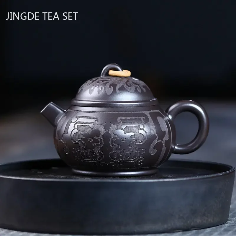 

Hand Carving Black Mud Teapot Authentic Yixing Purple Clay Tea Pot Chinese Teaware Tradition Zisha Beauty Kettle Tea Set 180ml