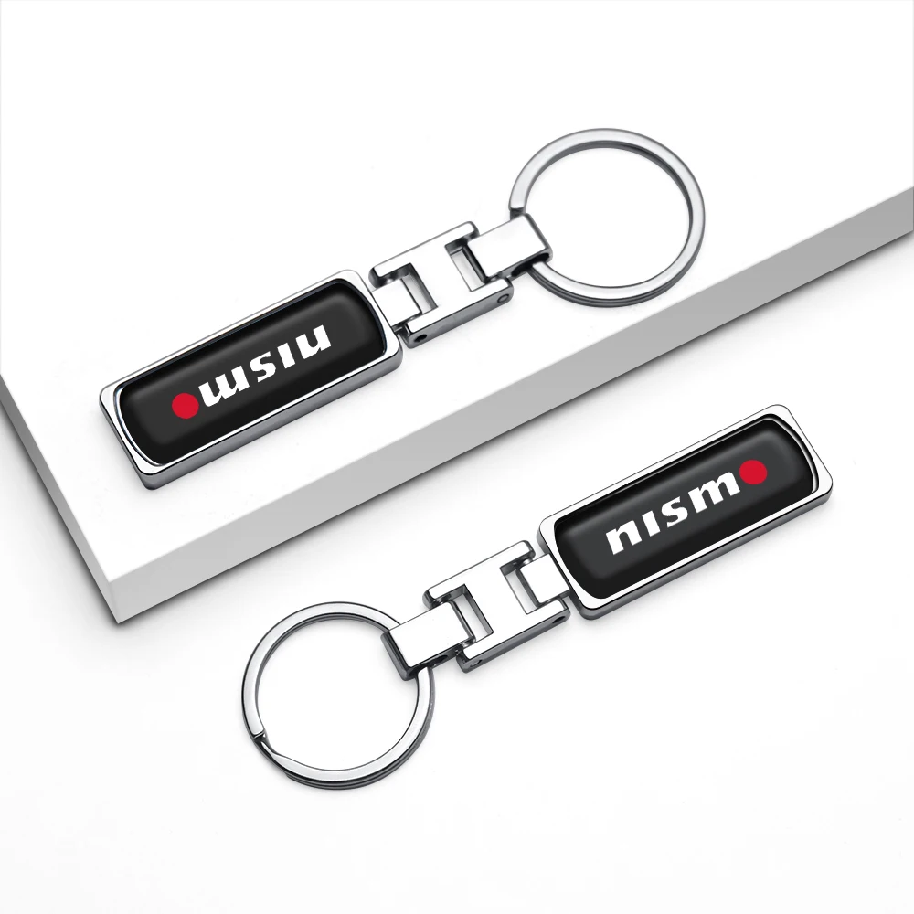 1Pcs Car Metal Epoxy Badge Keychain Keychain Ring Accessories For Nissan Nismo X-Trail 1 Qashqai Altima Note Leaf Murano Tiida