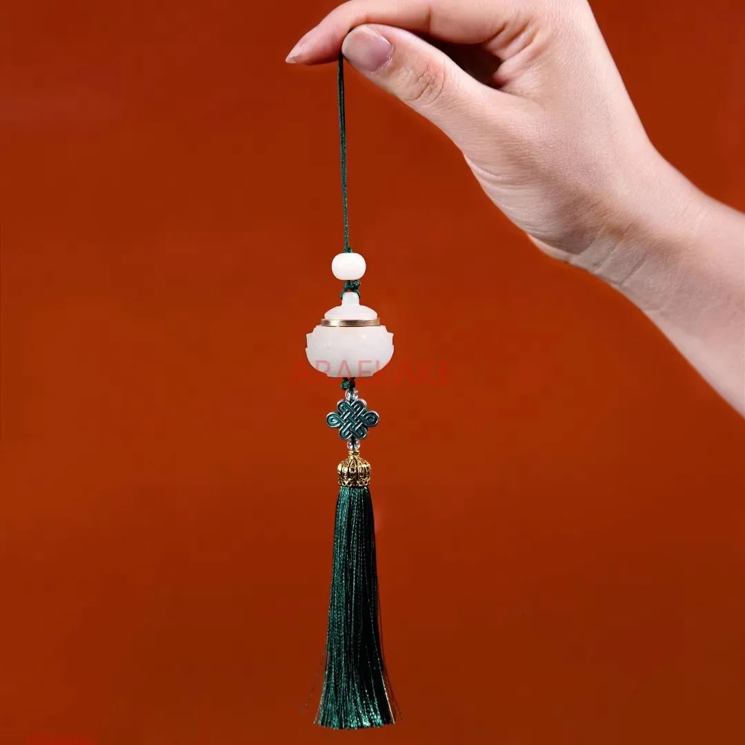 

Chinese ancient style, luminous fluorite, hollow lotus tassel, sachet pendant, mobile phone chain pendant jewelry