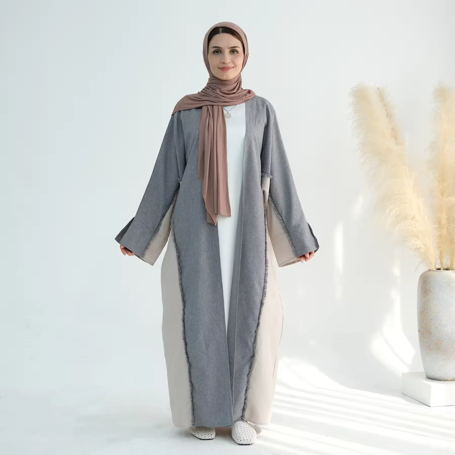 UAE Style Patchwork Muslim Abaya Belted Waist Functional Pockets Ideal for Dubai Inspired Modest Fashion Daily Social Occasions