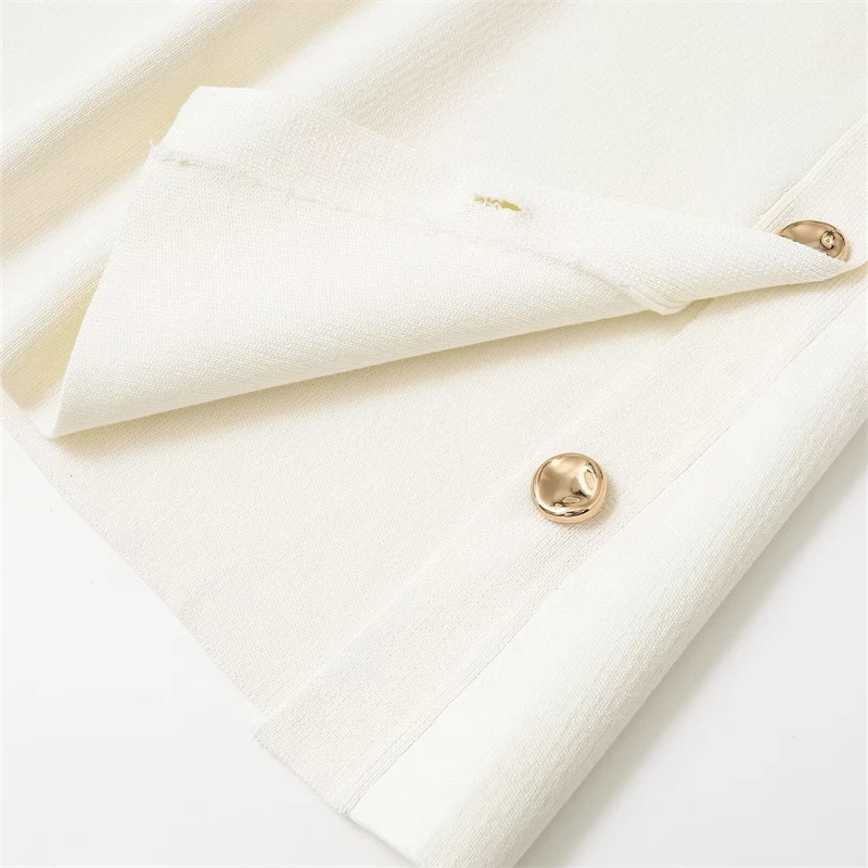 KEYANKETIAN letnia nowa damska złota ozdoba na guziki kamizelka z dzianiny styl rekreacyjny O-Neck sweter bez rękawów Camisole krótki top