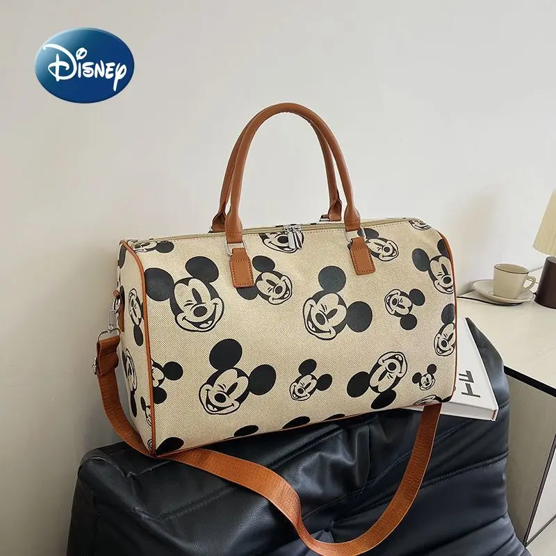 Nuevo bolso de viaje de Mickey de Disney, bolso de viaje portátil de marca de lujo a la moda para mujer, bolso de viaje tipo bandolera con un hombro