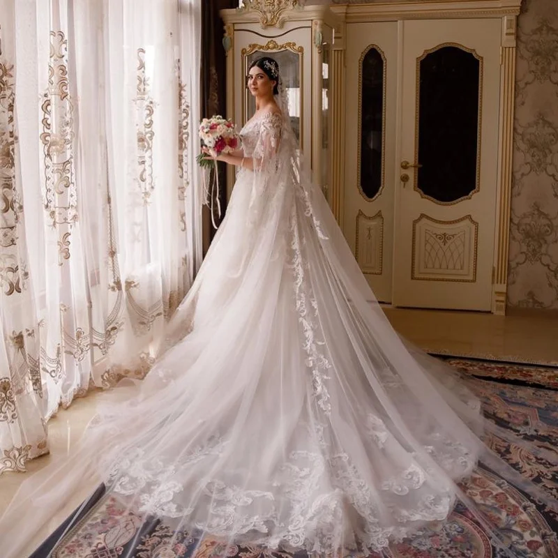 

Exquisite Wedding Dresses Sweetheart Illusion Sleeve Bride Dress Appliques A-Line Tulle Bridal Gown Customized robe de mariée