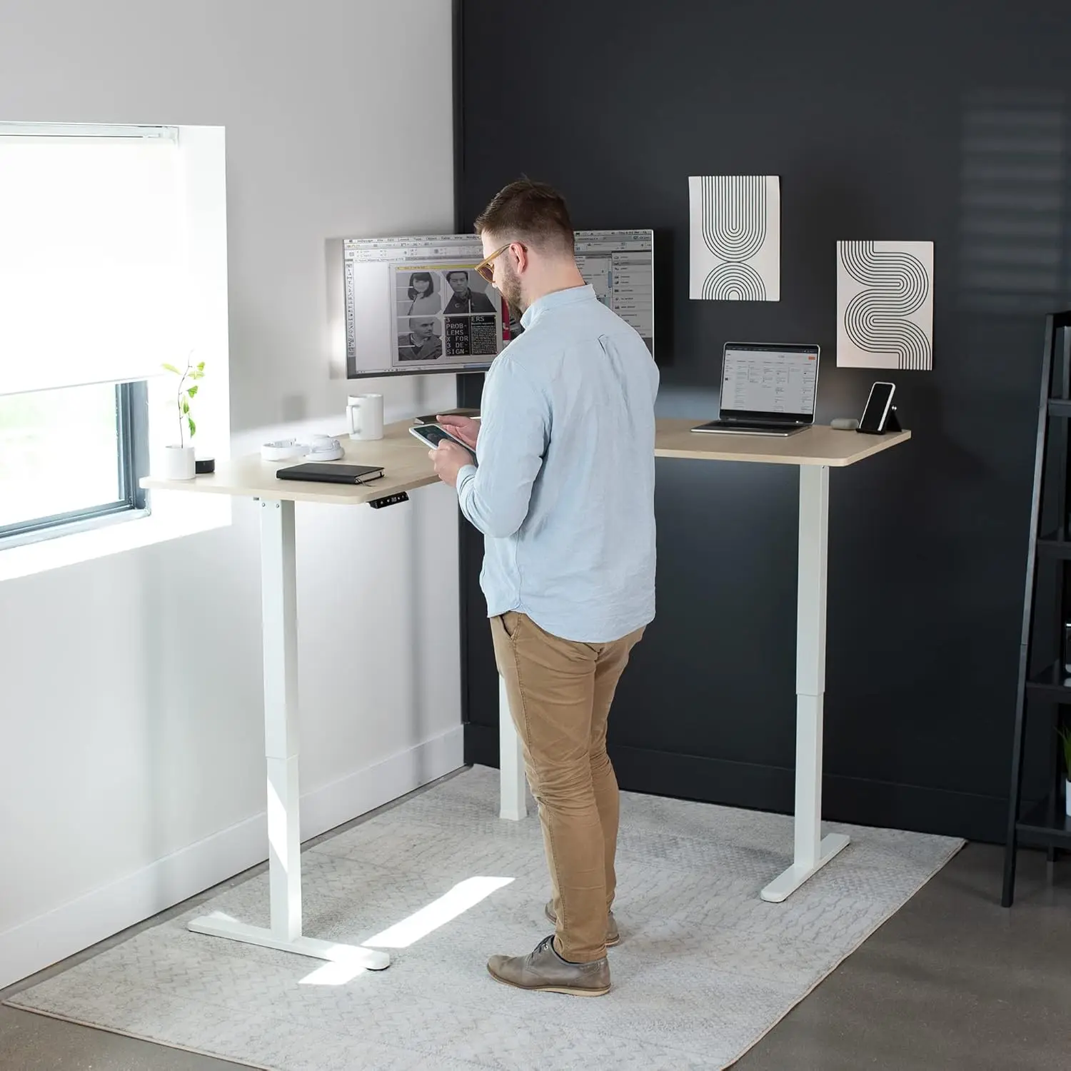 Height adjustable 63 x 55 inch angled upright office desk, light wood tabletop, white frame, L-shaped upright workstation