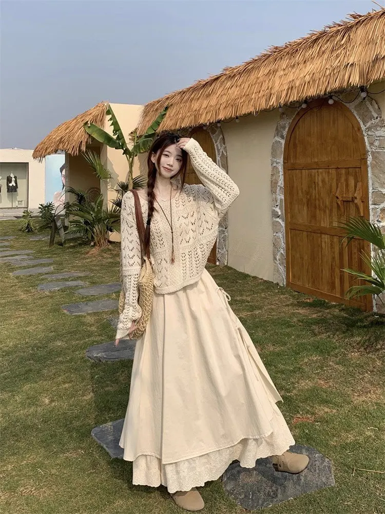 

Bohemian Holiday Style Women's Early Autumn Outfit Long Sleeve Hollow Knitted Sweater Midi Skirt Two Piece Set Travel Wear