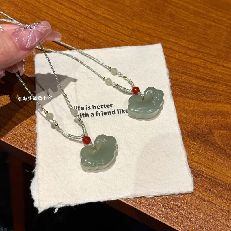 Natural Hetian jade clear water color auspicious cloud lock pendant pendant Hetian jade Ruyi lock jade pendant hand-woven