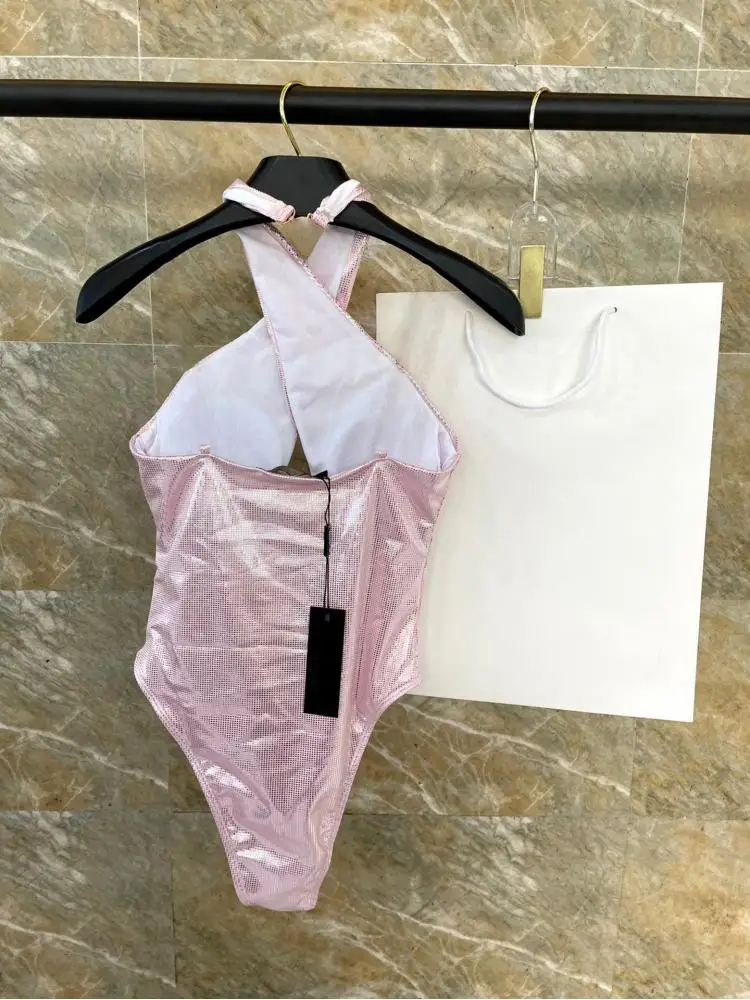 2025High end one-piece pink swimsuit, with a slightly chubby and sexy seaside style that covers the skin