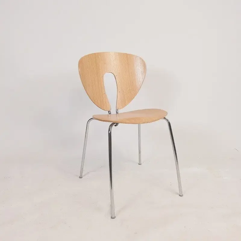 

*e for Arrival Retro Wooden Dining Chair with Distinctive Cutout Backrest and Durable Metal Frame for Stylish Dining Spaces *x