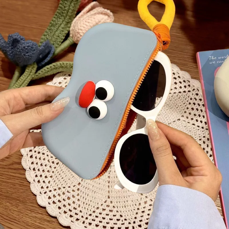 

A Silicone Glasses Case for Storage Featuring A Handle for Hanging Suitable for Travel and Portable Use It Is Waterproof