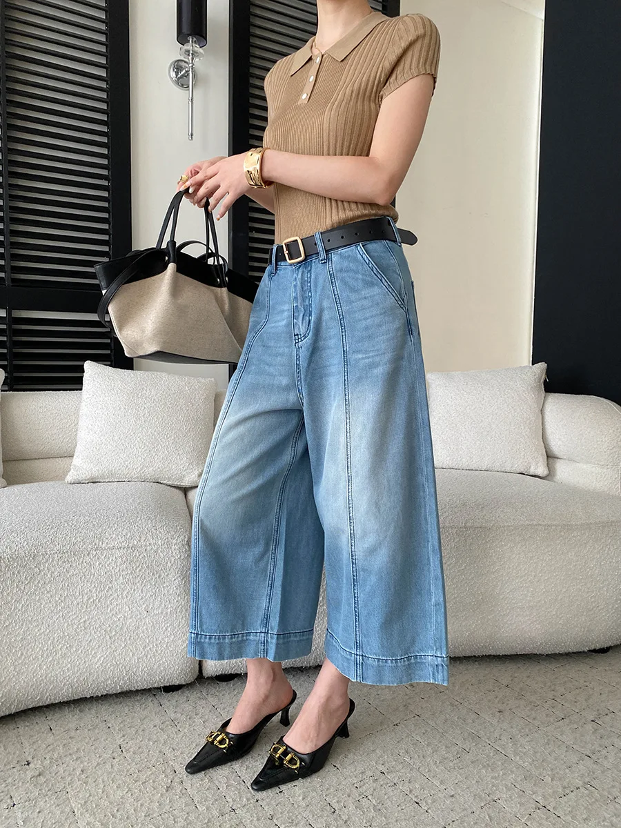 Sommerliche Damenjeans in unifarbenem Design mit hoher Taille, schlank machendem Schnitt und geradem, weitem Bein. – Detail 14