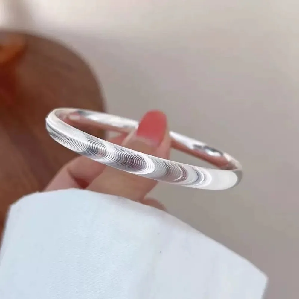 Brazalete versátil de aleación con diseño de ojo de gato, impermeable, con patrón de ondas, pulsera rígida cepillada, joyería de plata para mujer