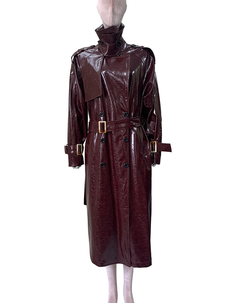 Trench lungo in ecopelle riflettente lucido autunnale per donna Cintura increspata Abiti eleganti di moda europea di design di lusso