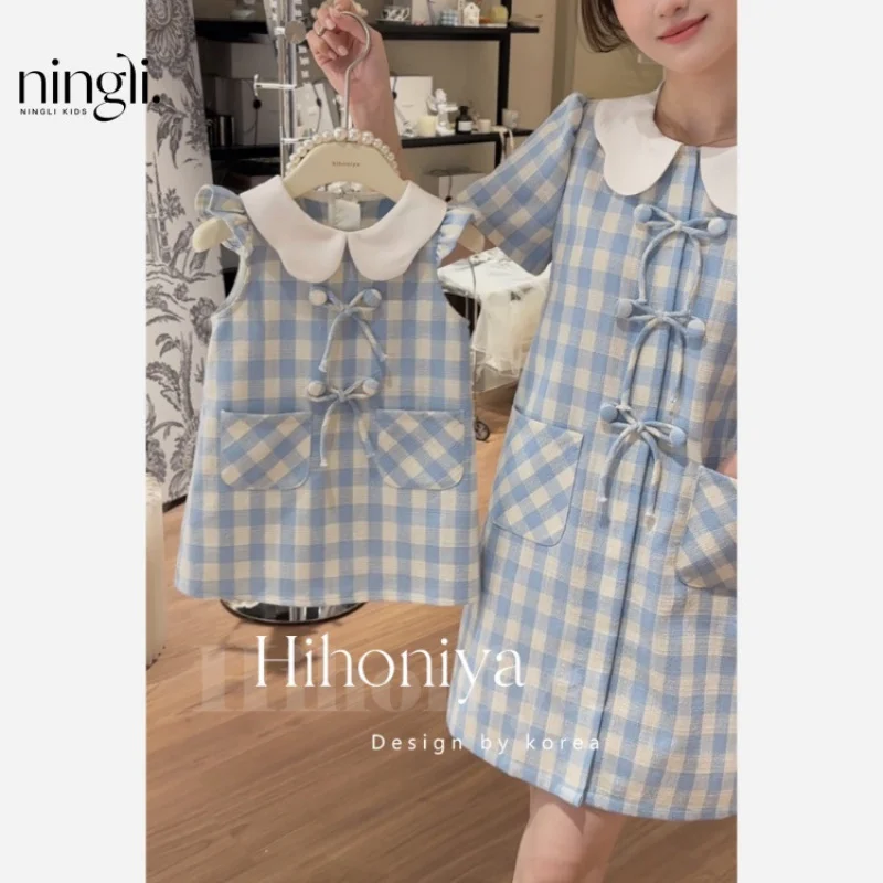 

NL-Korean Children's Clothing2024Summer New Peter Pan Collar Blue Plaid Bow Dress Summer Princess Dress