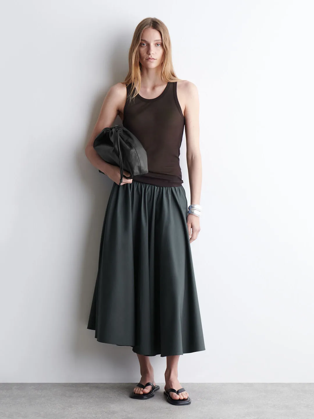 

Новая летняя женская юбка миди А-силуэта из карбонового материала, эластичная, плиссированная, для повседневной носки и офиса