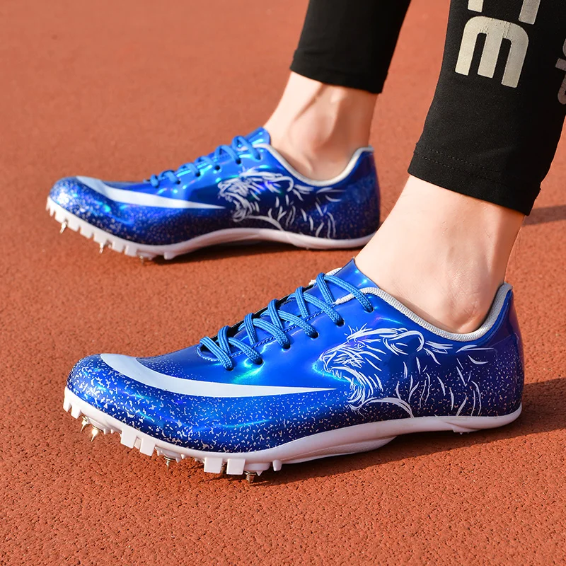 Man Track Spike Profesjonalne buty Lekkoatletyczne buty sportowe dla mężczyzn Kobiety Outdoor Kobiety Siłownia Trampki do biegania Czarny Biały