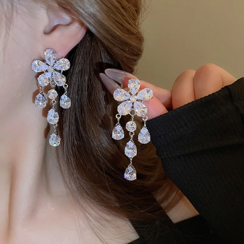 Light luxury zircon flower water drop fringed silver needle earrings, super flash niche temperament elegant high-end earrings