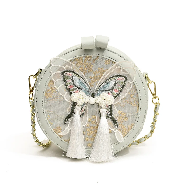 

Chinese Embroidery style bow shoulder bags niche crossbody bag ins women's tassel personalized crossbody small round bag